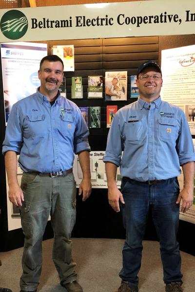 Image of BEC fair booth with employees