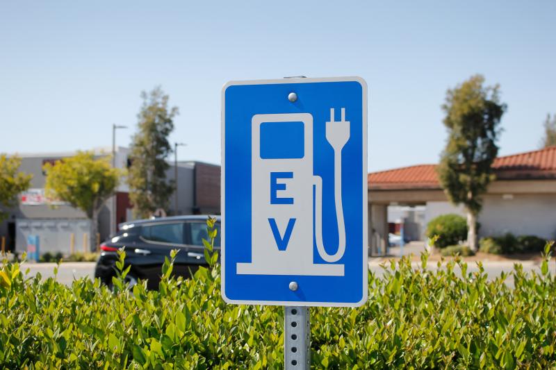 Electric vehicle charging sign