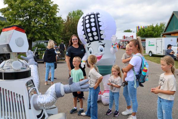 Children enjoy LED Lucy and Simon the Robot
