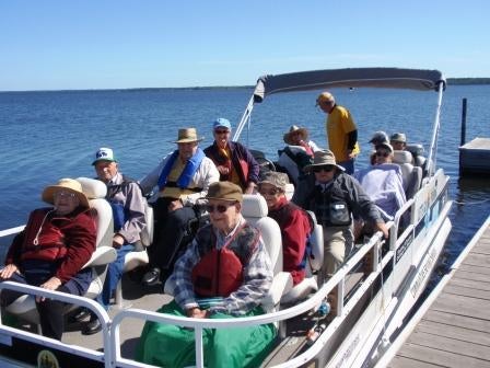 Let's Go Fishing with Seniors Pontoon at dock