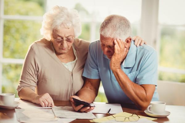 Couple looking at bills