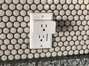 Smart plug in an outlet